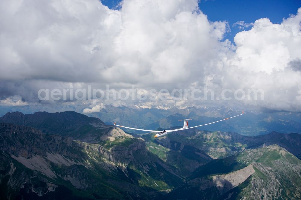 Montmaur from the bird's eye view: Glider EB28 D-KQWB in flight over the mountain Pic de Bure at Montmaur in Provence-Alpes-Cote d'Azur, France. The EB 28 is a double-seated glider of the open class