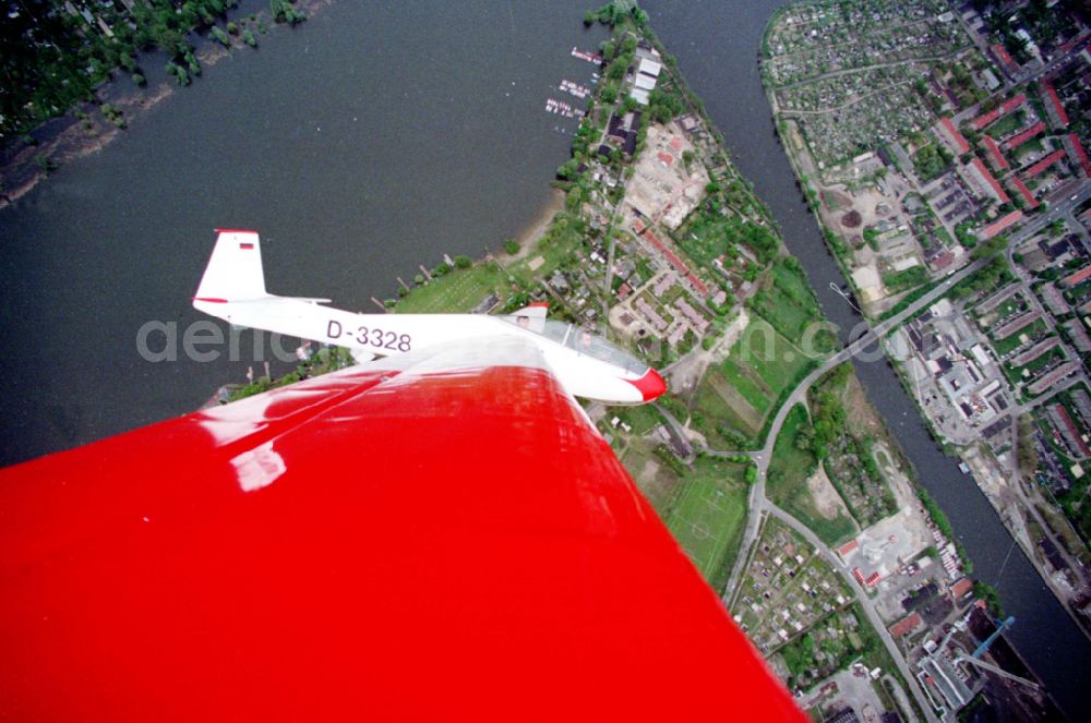 Brandenburg an der Havel from above - Glider and sports aircraft PZL Bielsko SZD-9 Bocian with the registration D-3328 in a banked turn in flight over the airspace in Brandenburg an der Havel in the state Brandenburg, Germany