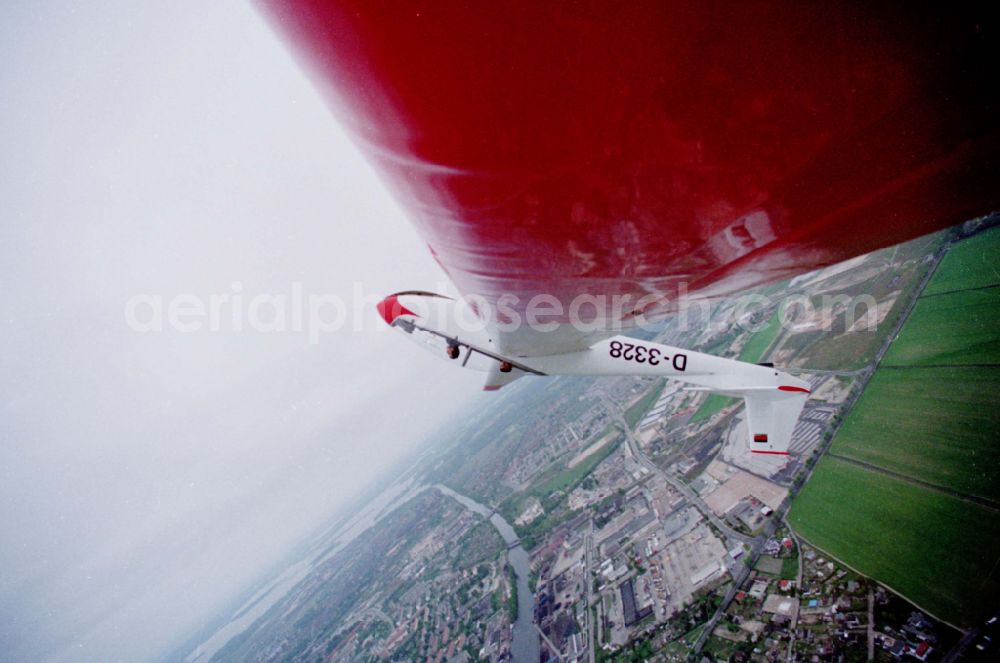 Aerial photograph Brandenburg an der Havel - Glider and sports aircraft PZL Bielsko SZD-9 Bocian with the registration D-3328 in a banked turn in flight over the airspace in Brandenburg an der Havel in the state Brandenburg, Germany