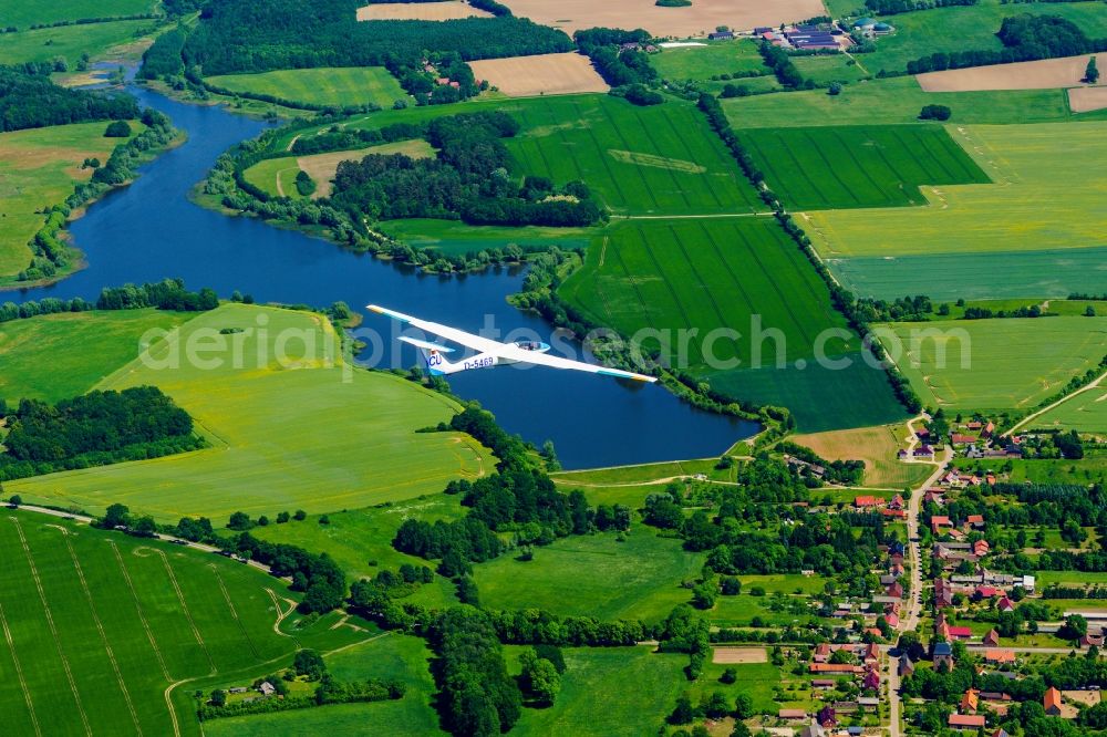 Kümmernitztal from above - Glider SZD-36 Cobra in flight over the Predoeler reservoir in Gerdshagen in the state of Brandenburg, Germany