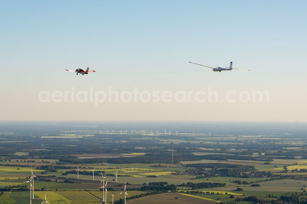 Aerial image Pritzwalk - Glider and sport aircraft SZD 54 Perkoz while towing over the airspace in Pritzwalk in the state Brandenburg, Germany