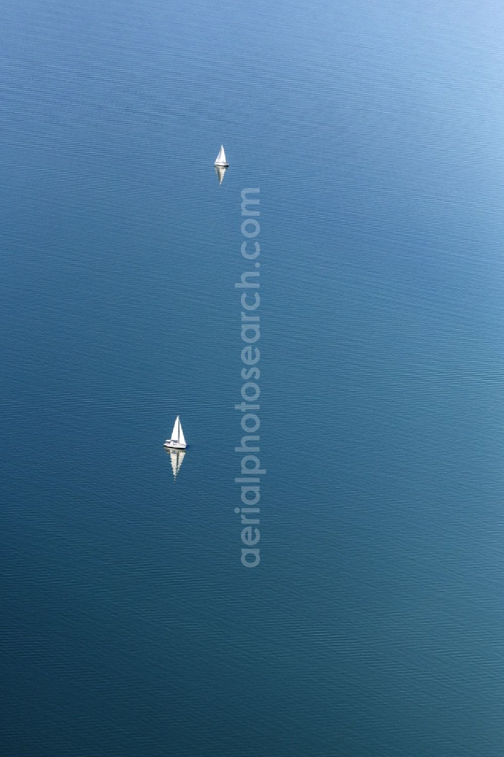 Aerial image Chiemsee - Sailboat under way on Chiemsee in the state Bavaria, Germany