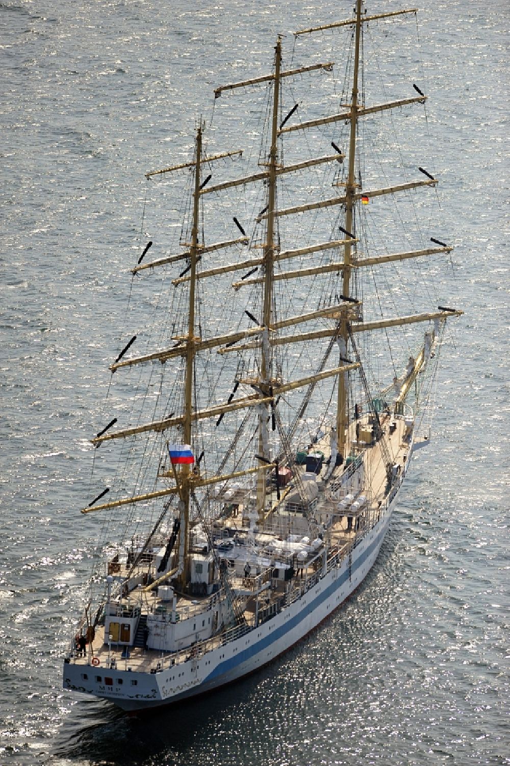 Aerial image Rostock - View of the training ship MIR in the Baltic Sea off Rostock in Mecklenburg Western Pomerania. It is owned by the Admiral Makarov Academy in Saint Petersburg, was built in the Lenin shipyard in Danzig and is considered one of the fastest tall ships in the world