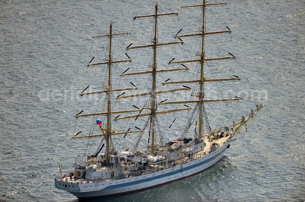 Rostock from above - View of the training ship MIR in the Baltic Sea off Rostock in Mecklenburg Western Pomerania. It is owned by the Admiral Makarov Academy in Saint Petersburg, was built in the Lenin shipyard in Danzig and is considered one of the fastest tall ships in the world