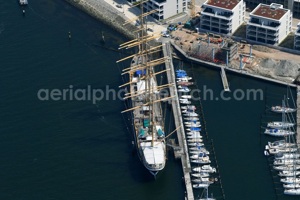 Aerial photograph Lübeck - Sailboat Viermastbark Passat Am Priwallhafen in the harbor in Luebeck in the state Schleswig-Holstein, Germany