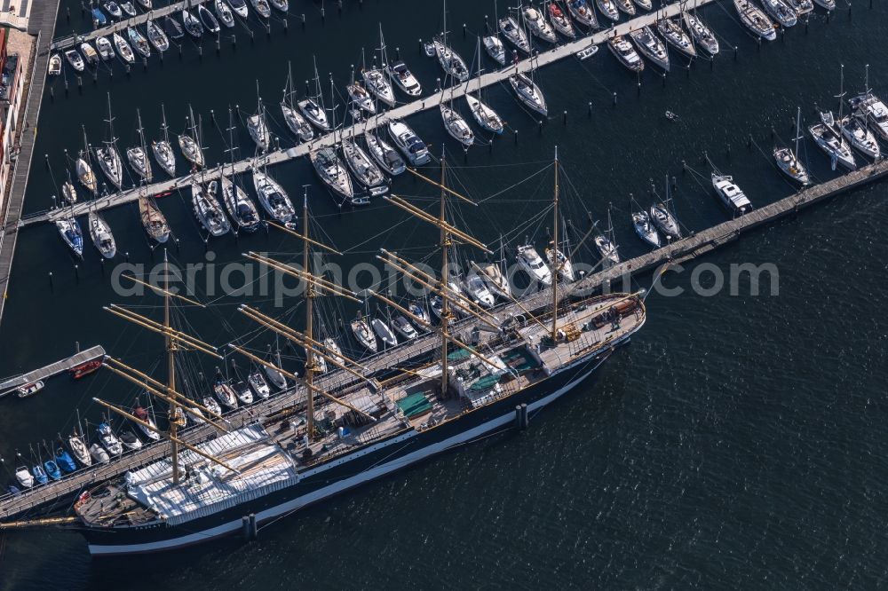 Travemünde from the bird's eye view: Sailboat Viermastbark Passat Am Priwallhafen in the harbor in Travemuende in the state Schleswig-Holstein, Germany