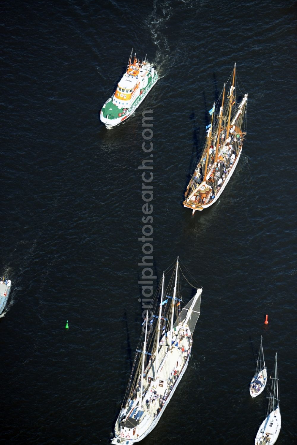 Aerial photograph Rostock - Sailboat underway at the Unterwarnow in Rostock in the state Mecklenburg - Western Pomerania