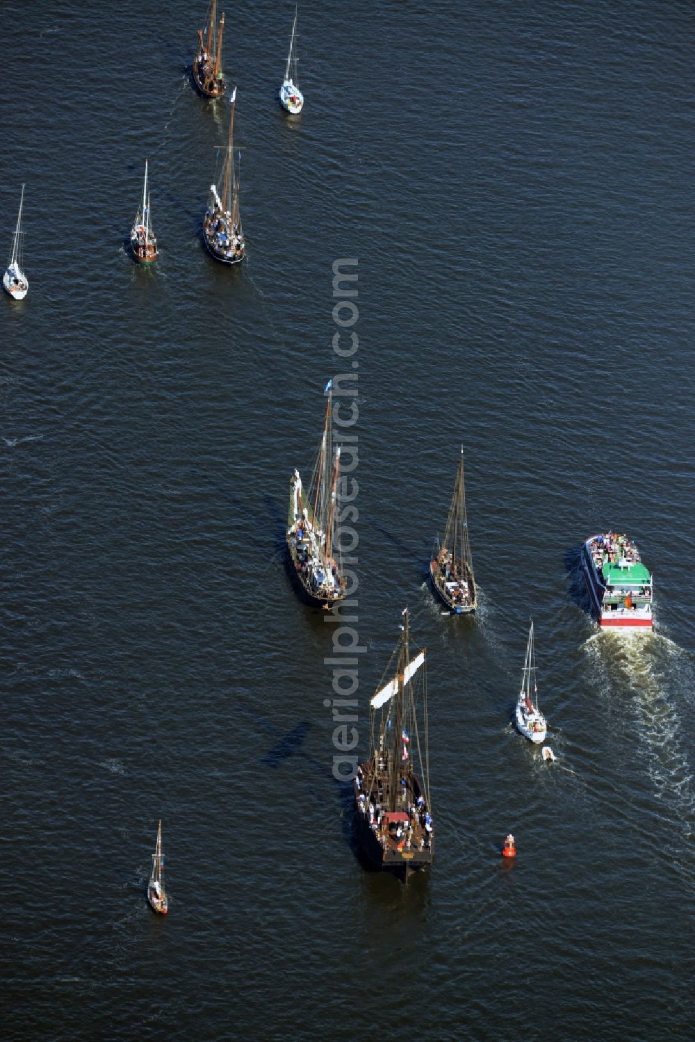 Rostock from the bird's eye view: Sailboat underway on the Unterwarnow in Rostock in the state Mecklenburg - Western Pomerania