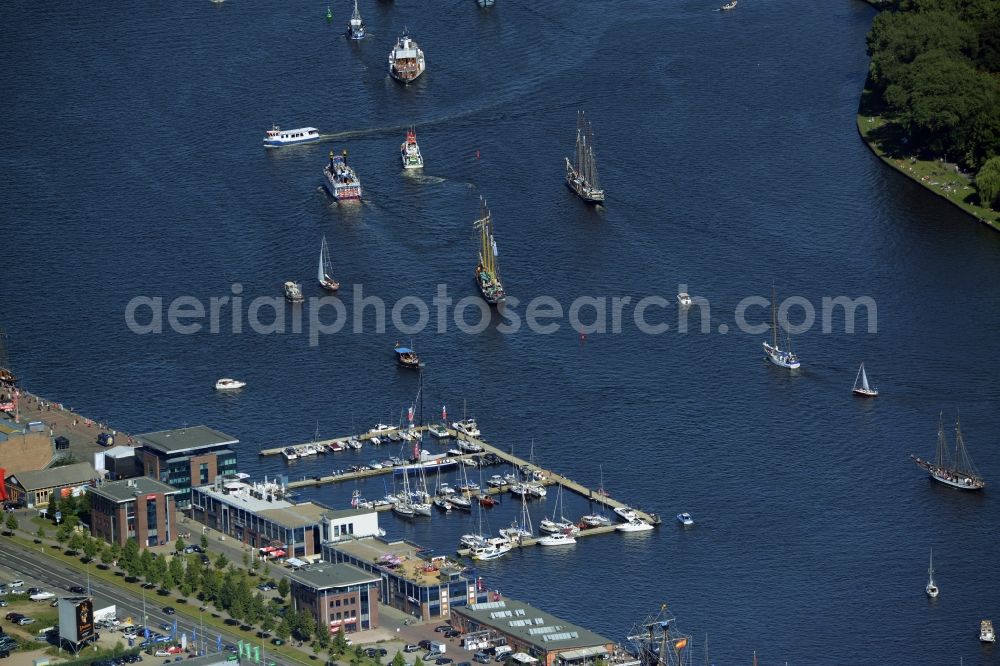 Rostock from above - Sailboat of german Hanse Sail in Rostock in the state Mecklenburg - Western Pomerania