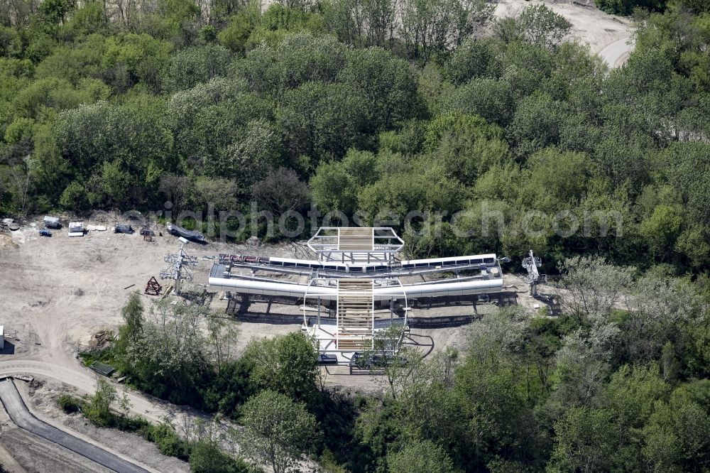 Berlin from above - Cable car station and construction works on Kienberg hill on the premises of the IGA 2017 in the district of Marzahn-Hellersdorf in Berlin, Germany. The station and stop is part of a panoramic cable car route connecting the western and eastern entrance of the IGA garden show premises