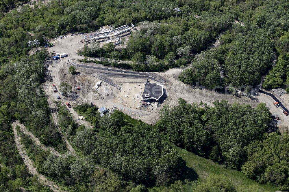 Aerial image Berlin - Cable car station and construction works on Kienberg hill on the premises of the IGA 2017 in the district of Marzahn-Hellersdorf in Berlin, Germany. The station and stop is part of a panoramic cable car route connecting the western and eastern entrance of the IGA garden show premises