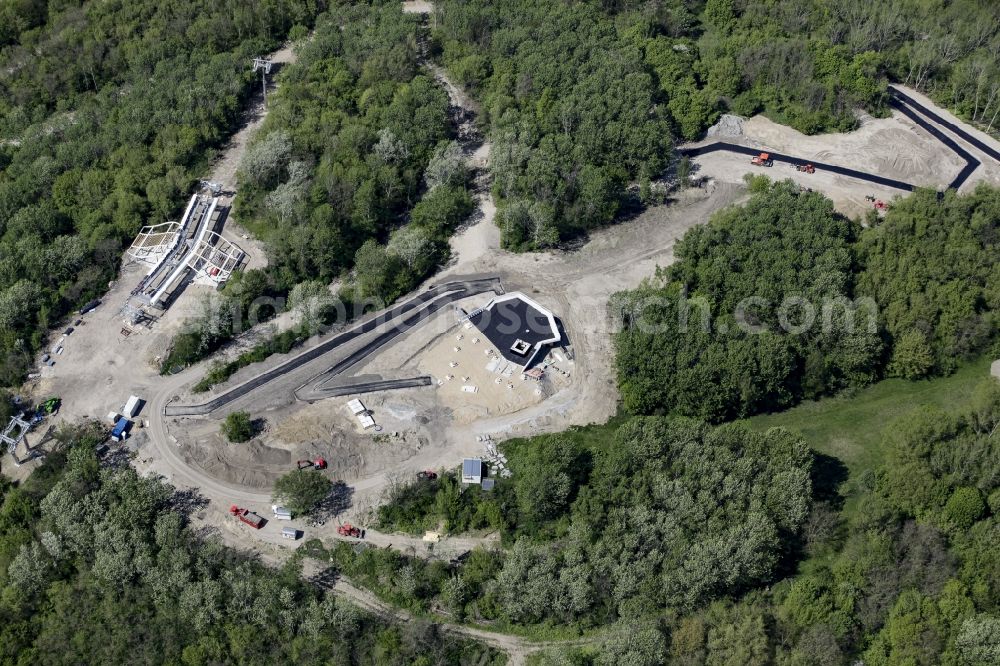 Berlin from above - Cable car station and construction works on Kienberg hill on the premises of the IGA 2017 in the district of Marzahn-Hellersdorf in Berlin, Germany. The station and stop is part of a panoramic cable car route connecting the western and eastern entrance of the IGA garden show premises