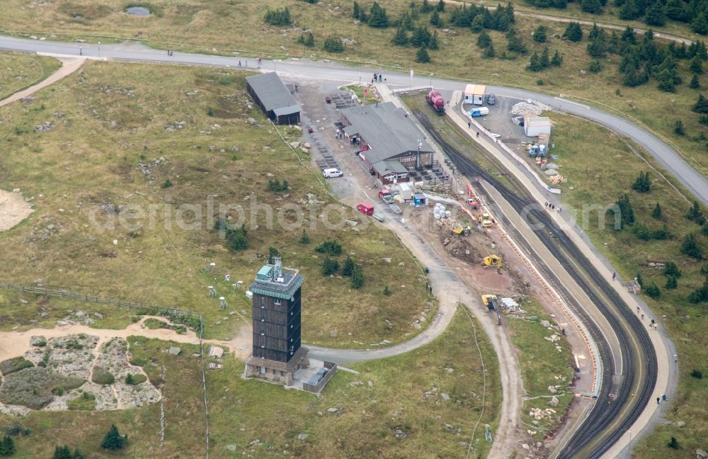 Wernigerode from above - Buildings on the hill summit of the Brocken in the Harz near Wernigerode in the state Saxony-Anhalt. These are a transmitter site with a radio mast, as well as a weather station and the Brockenhaus