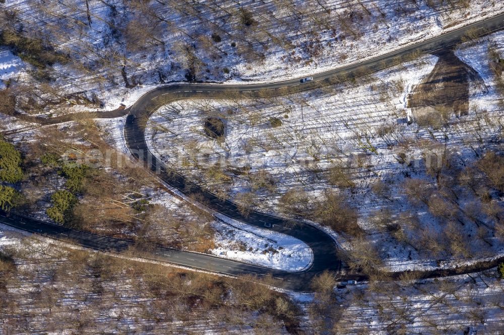 Aerial image Fredeburg - Serpentine-like S-curve in the road in winter at Fredeburg in North Rhine-Westphalia