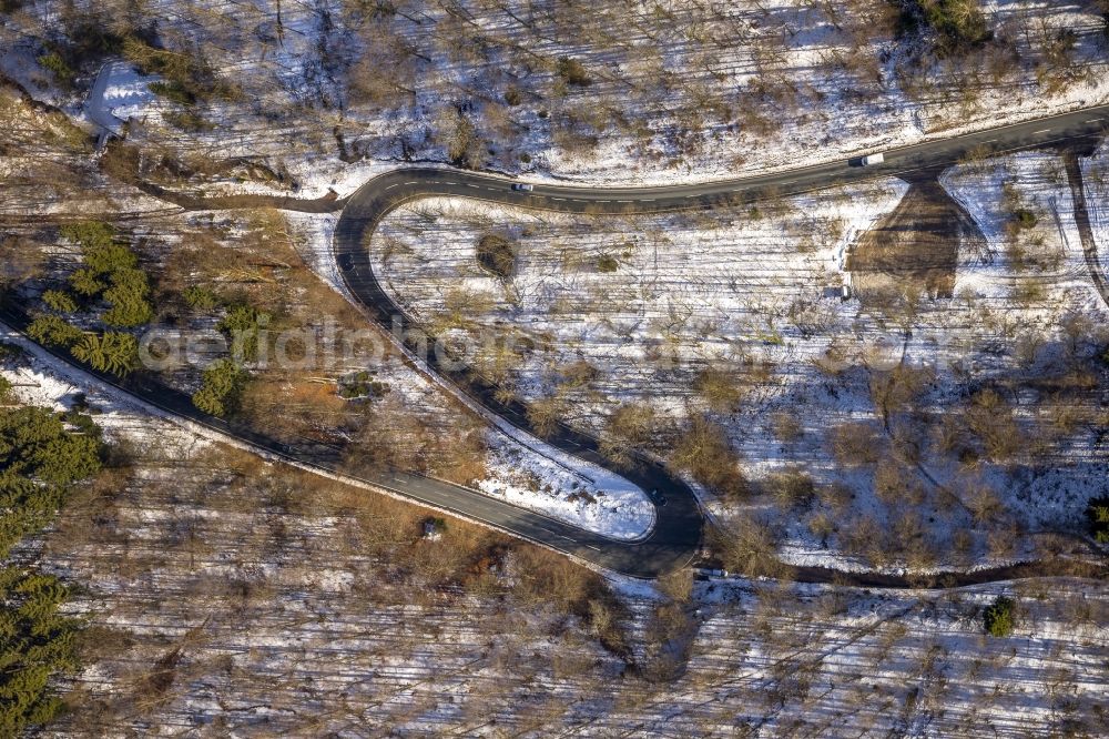 Aerial photograph Fredeburg - Serpentine-like S-curve in the road in winter at Fredeburg in North Rhine-Westphalia