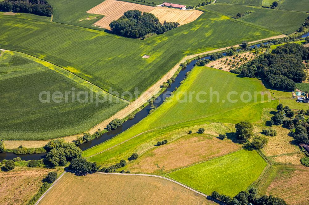 Datteln from the bird's eye view: meandering, serpentine curve of river of Lippe in Olfen in the state North Rhine-Westphalia, Germany