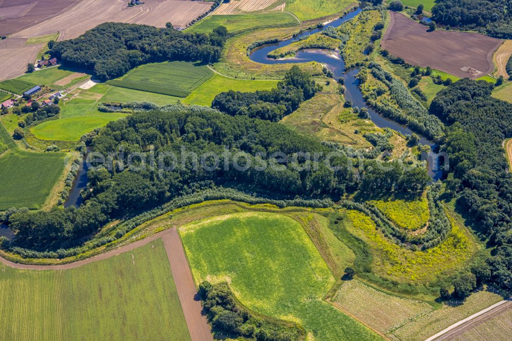 Datteln from the bird's eye view: meandering, serpentine curve of river of Lippe in Olfen in the state North Rhine-Westphalia, Germany