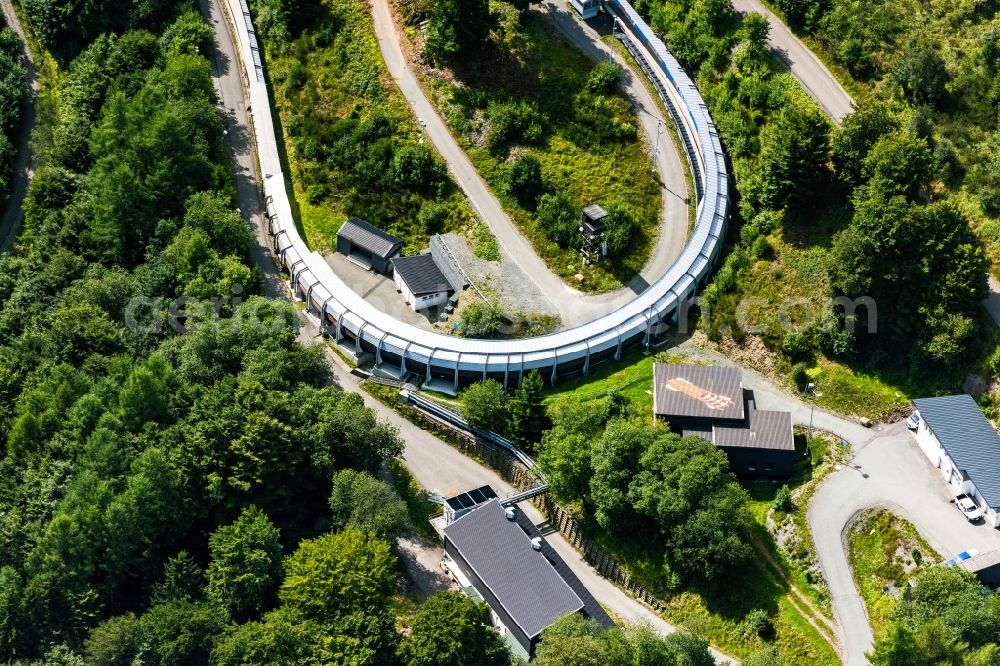 Winterberg from above - Serpentine curve of the racetrack route of Bobbahn Winterberg Hochsauerland in Winterberg in the state North Rhine-Westphalia