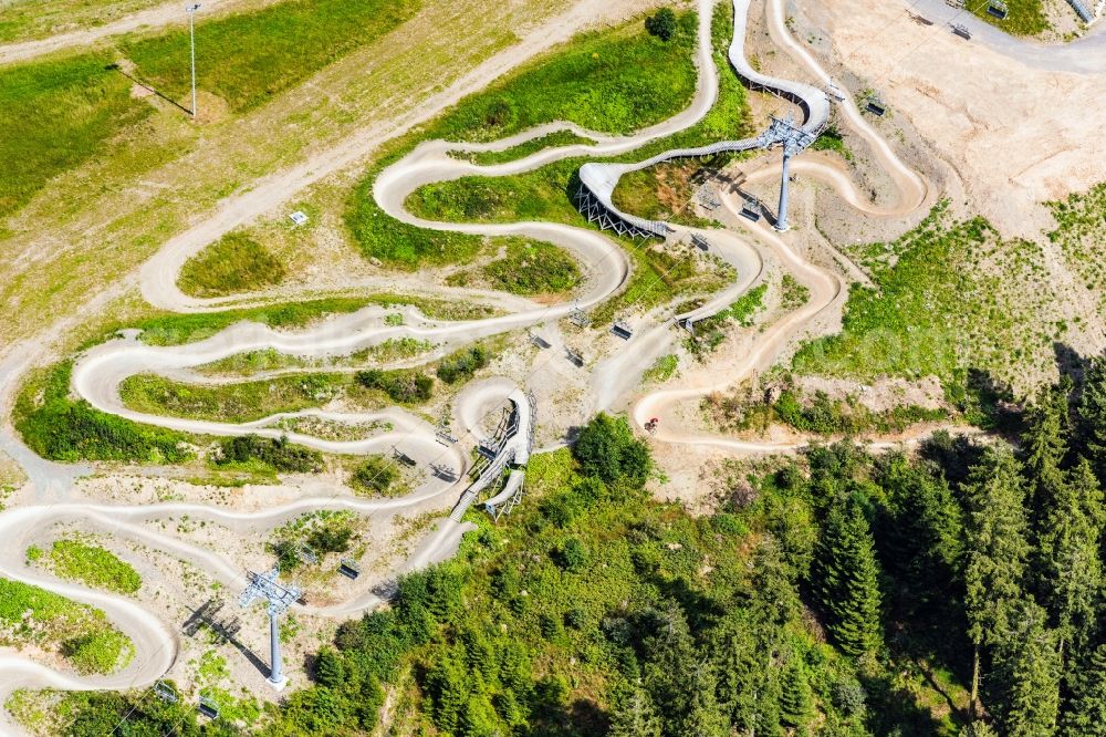 Winterberg from above - Serpentine curve of the racetrack route of Bobbahn Winterberg Hochsauerland in Winterberg in the state North Rhine-Westphalia