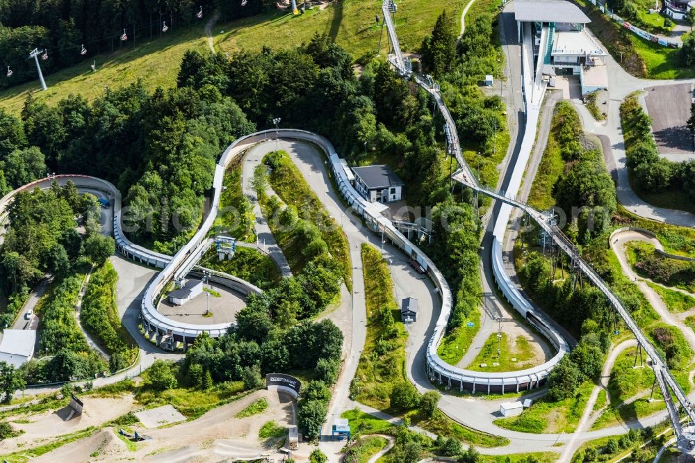 Aerial photograph Winterberg - Serpentine curve of the racetrack route of Bobbahn Winterberg Hochsauerland in Winterberg in the state North Rhine-Westphalia