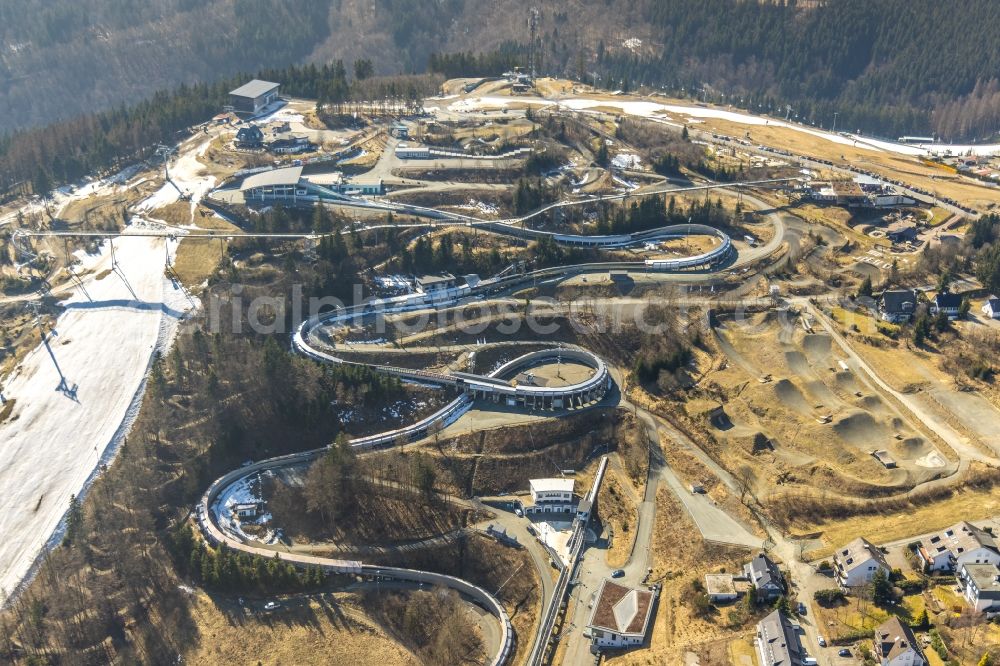 Winterberg from above - serpentine curve of the racetrack route of Bobbahn Winterberg Hochsauerland in Winterberg in the state North Rhine-Westphalia