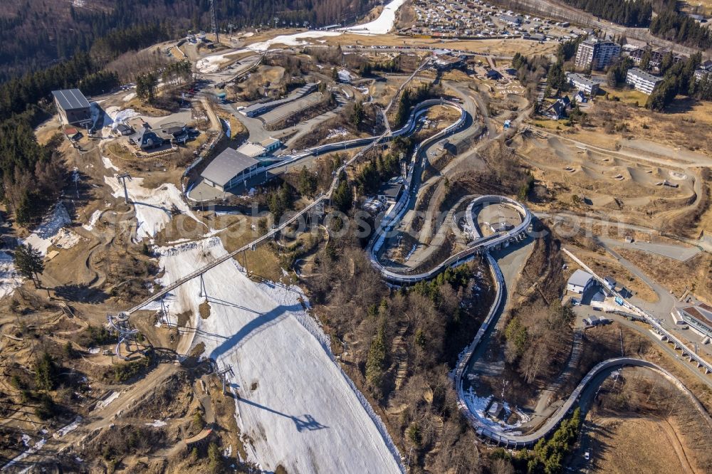 Aerial photograph Winterberg - serpentine curve of the racetrack route of Bobbahn Winterberg Hochsauerland in Winterberg in the state North Rhine-Westphalia