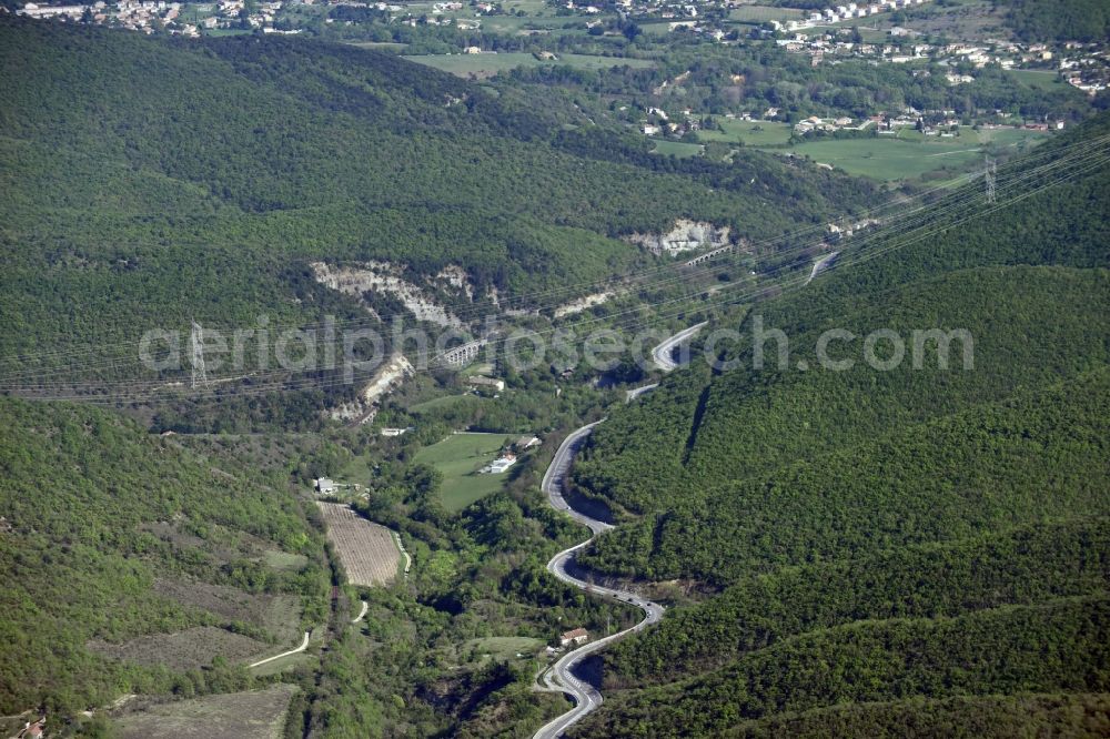 Aubignas from above - Serpentine-shaped curve of a road N102 - in Aubignas in Auvergne Rhone-Alpes, France