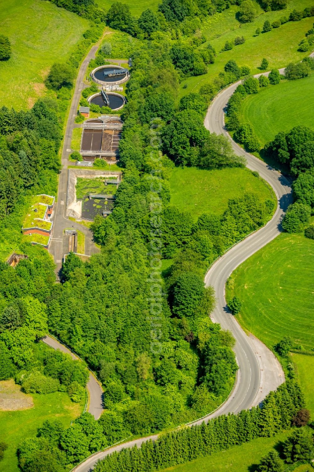 Breckerfeld from above - Serpentine-shaped curve of a road guide in Breckerfeld in the state North Rhine-Westphalia, Germany