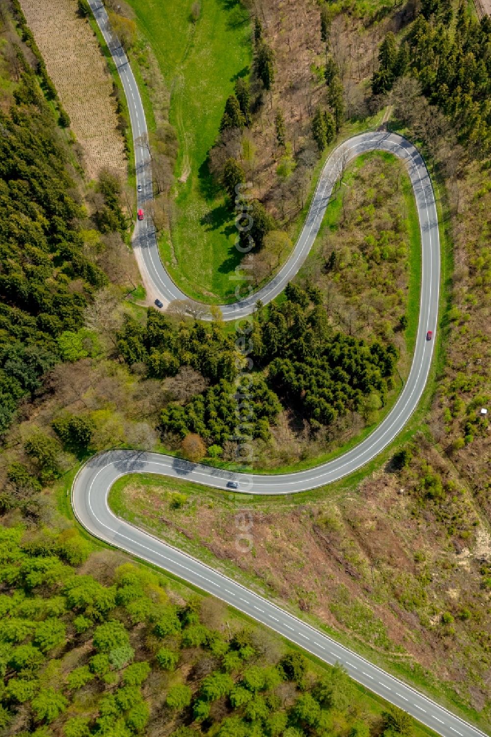 Aerial image Brilon - Serpentine-shaped curve of a road guide in Brilon in the state North Rhine-Westphalia, Germany