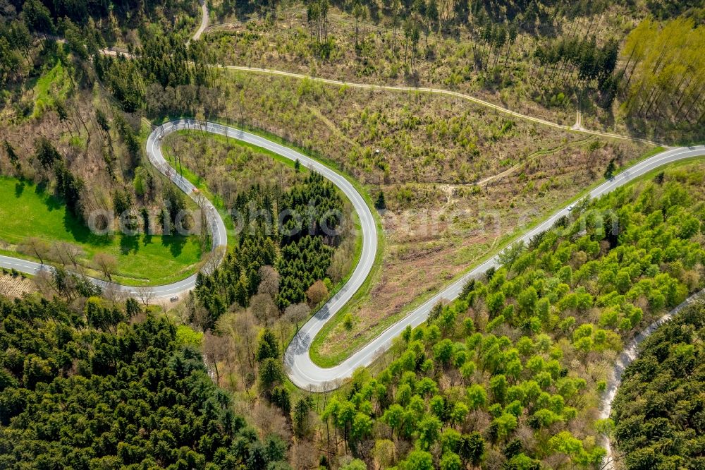 Brilon from above - Serpentine-shaped curve of a road guide in Brilon in the state North Rhine-Westphalia, Germany