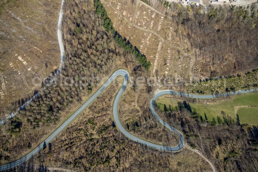 Brilon from above - Serpentine-shaped curve of a road guide of L870 in Brilon at Sauerland in the state North Rhine-Westphalia, Germany