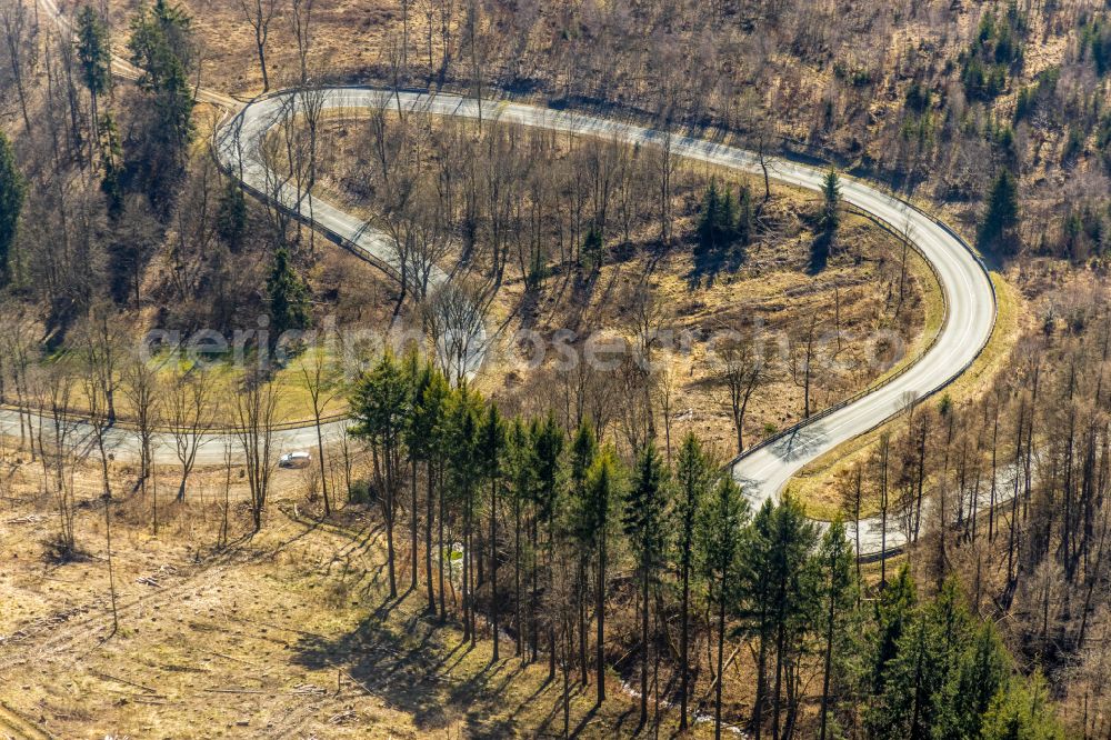 Brilon from the bird's eye view: Serpentine-shaped curve of a road guide of L870 in Brilon at Sauerland in the state North Rhine-Westphalia, Germany