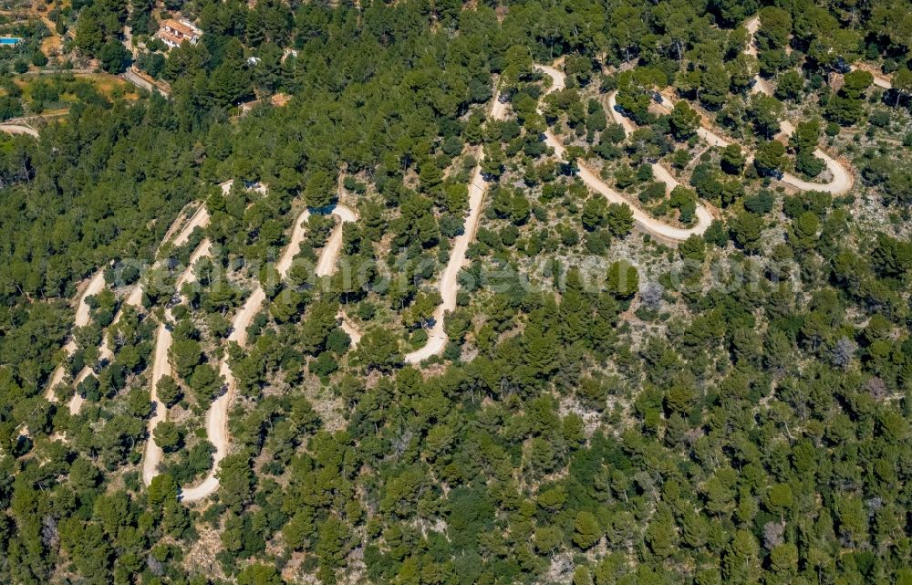 Bunyola from the bird's eye view: Serpentine-shaped curve of a road guide in Bunyola in Balearic island of Mallorca, Spain