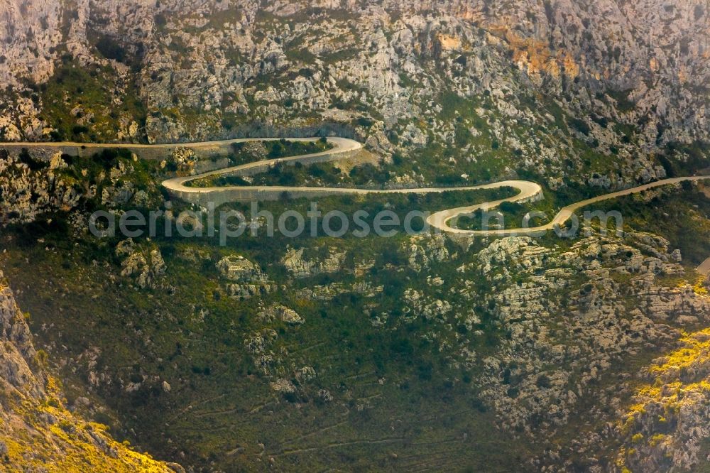 Aerial image Escorca - Serpentine-shaped curve of a road guide of Ma-2141 in Escorca in Balearische Insel Mallorca, Spain