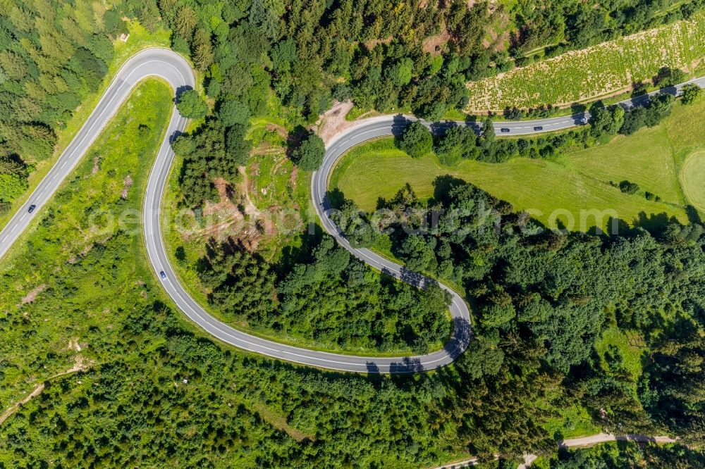 Aerial photograph Brilon - Serpentine-shaped curve of a road guide of street L870 Am Bilstein in Brilon in the state North Rhine-Westphalia, Germany