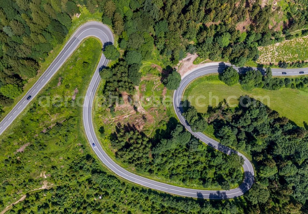 Brilon from above - Serpentine-shaped curve of a road guide of street L870 Am Bilstein in Brilon in the state North Rhine-Westphalia, Germany