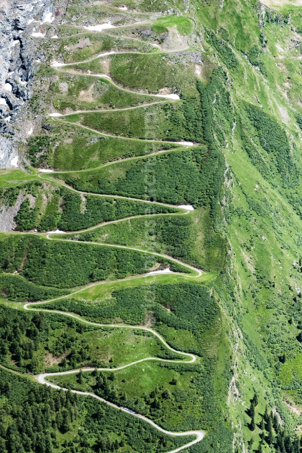 Aerial photograph Mittersill - Serpentine-shaped curve of a road guide in Mittersill in Salzburg, Austria