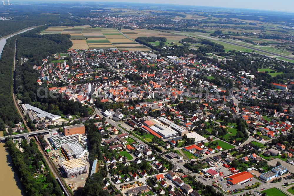 Aerial photograph Leipheim - Blick auf Leipheim. Die Stadt liegt in der Donau-Iller Region am Südrand des Schwäbischen Donaumooses. Oben rechts verläuft der ehemalige Fliegerhorst. Unten links ist die Baustelle zum Ausbau des Werk 2 der Firma Wanzl zu sehen, direkt neben der Donau (linker Bildrand). Kontakt: Tourist Information Günzburg Leipheim, Schloßplatz 1 89312 Günzburg, Tel. +49(0)8221 20044 4, Fax +49(0)8221 20044 6, Email: tourist-information@guenzburg.de