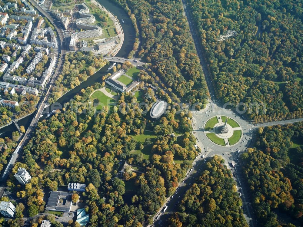 Berlin from above - The Siegessaeule at Grosser Stern in the middle of the Tiergarten in Berlin, was built from 1864 to 1873 as a national monument to the unification wars, designed by Heinrich Strack. Also on display is the Bundespraesidialamt and the street of the 17th June