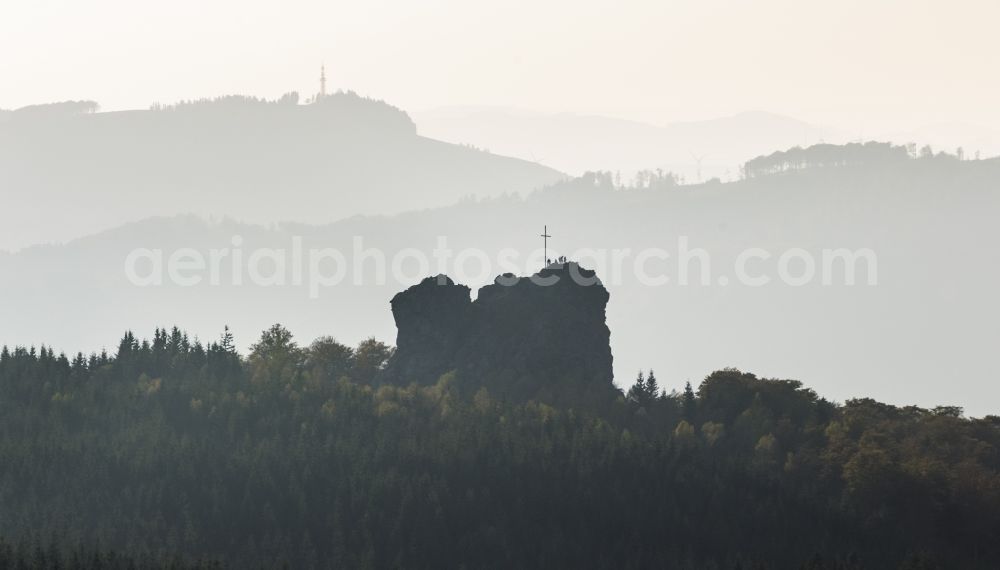 Aerial photograph Brilon - Silhouette backlight silhouette-like rock formation Bruchhauser stones near Brilon in the state of North Rhine-Westphalia. The known archaeological site is located in a conservation area of the Rothaargebirge