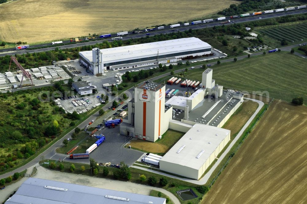 Aerial image Heidegrund - High silo and grain storage with adjacent storage Thueringer Muehlenwerke GmbH on Muehlenstrasse in the district Weickelsdorf in Heidegrund in the state Saxony-Anhalt, Germany