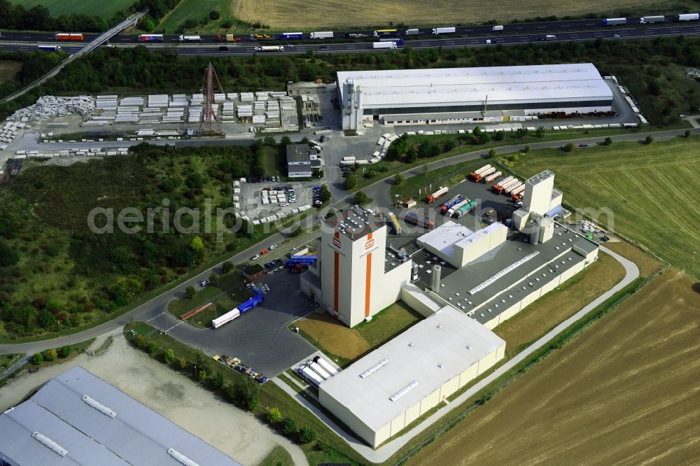 Aerial photograph Heidegrund - High silo and grain storage with adjacent storage Thueringer Muehlenwerke GmbH on Muehlenstrasse in the district Weickelsdorf in Heidegrund in the state Saxony-Anhalt, Germany