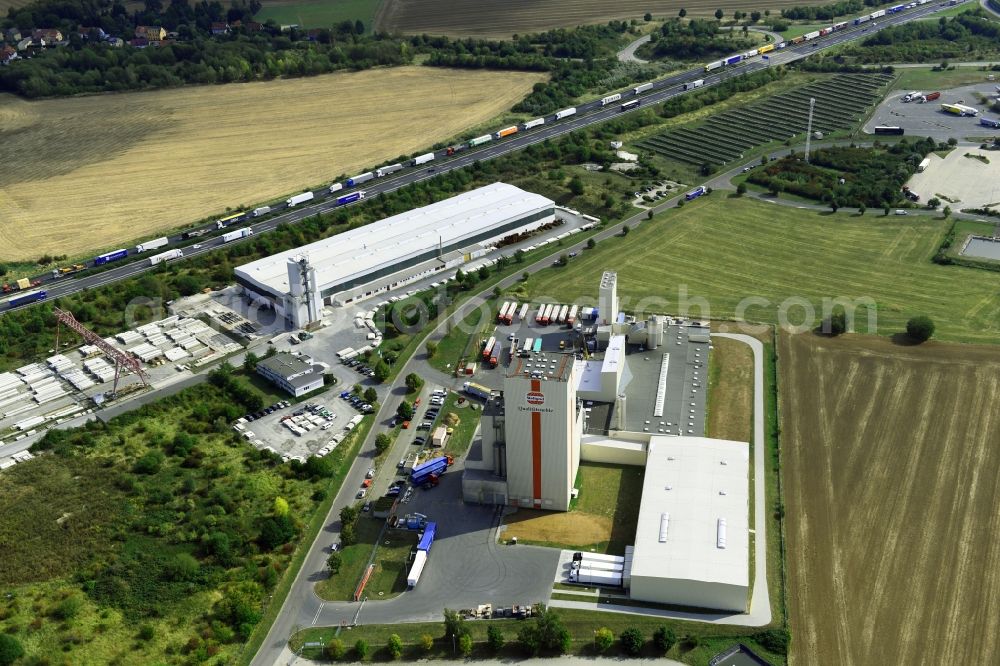 Aerial image Heidegrund - High silo and grain storage with adjacent storage Thueringer Muehlenwerke GmbH on Muehlenstrasse in the district Weickelsdorf in Heidegrund in the state Saxony-Anhalt, Germany