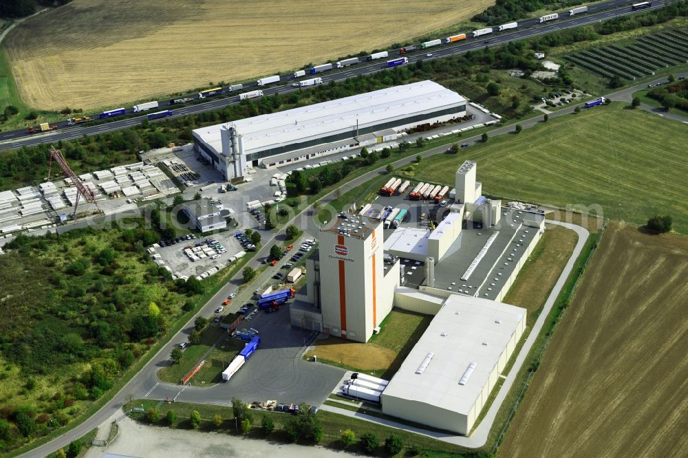 Aerial photograph Heidegrund - High silo and grain storage with adjacent storage Thueringer Muehlenwerke GmbH on Muehlenstrasse in the district Weickelsdorf in Heidegrund in the state Saxony-Anhalt, Germany