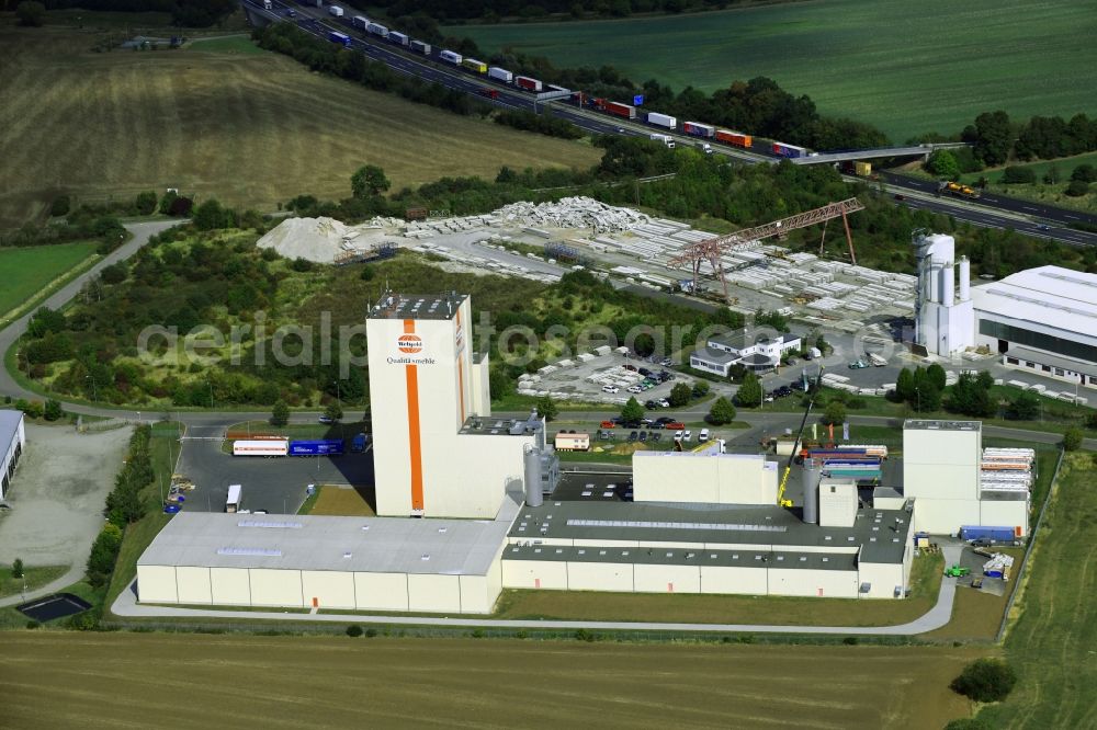 Heidegrund from above - High silo and grain storage with adjacent storage Thueringer Muehlenwerke GmbH on Muehlenstrasse in the district Weickelsdorf in Heidegrund in the state Saxony-Anhalt, Germany