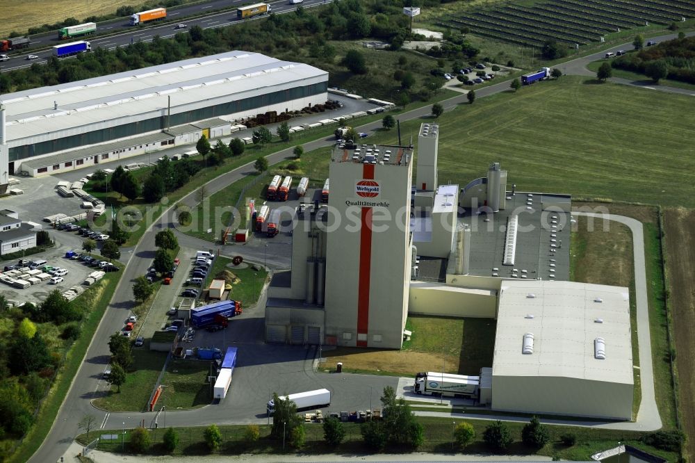 Aerial photograph Heidegrund - High silo and grain storage with adjacent storage Thueringer Muehlenwerke GmbH on Muehlenstrasse in the district Weickelsdorf in Heidegrund in the state Saxony-Anhalt, Germany