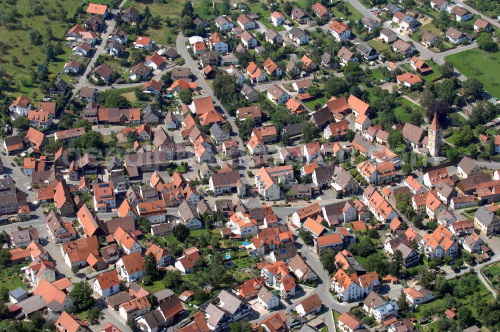 Aerial photograph Simmozheim - Blick über Simmozheim mit Kirche und Sparkasse.