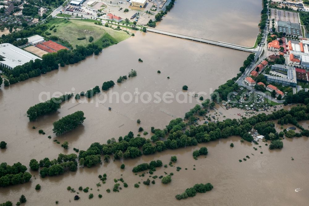 Dresden from above - The situation during the flooding in East Germany on the bank of the river Elbe at the Dresden Exhibition Center in the city of Dresden in the state of Saxony. The ring road around the Exhibition Center is flooded and Schlachthof Street becomes a bridge