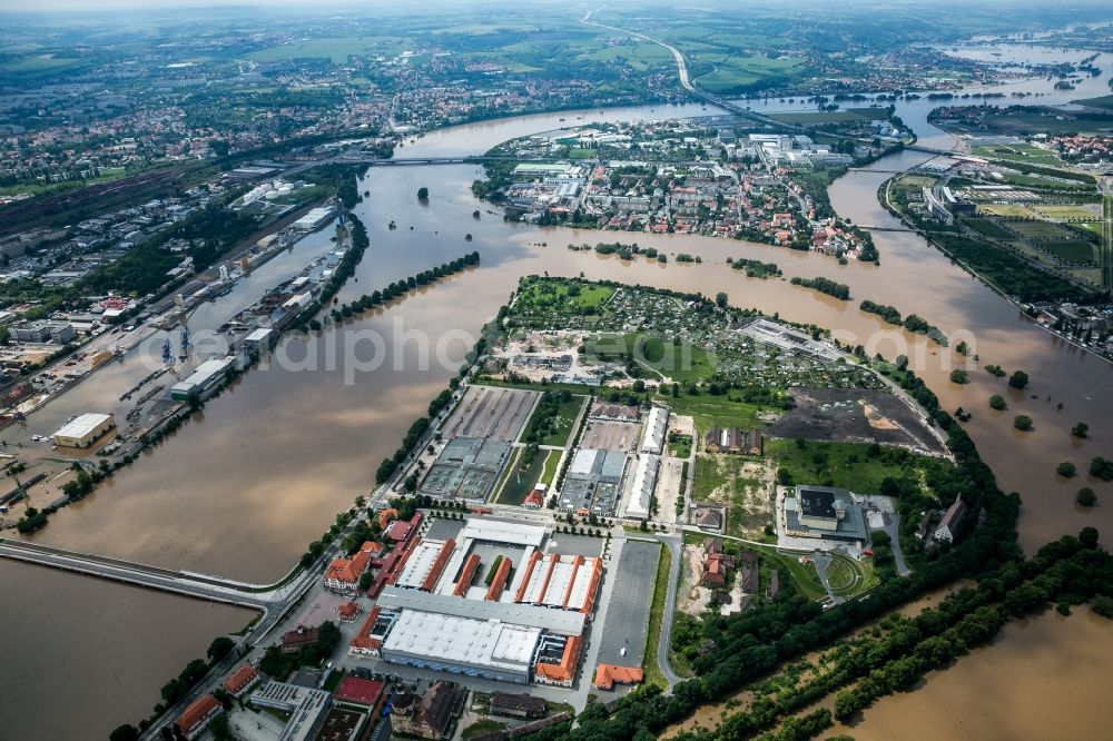 Dresden from the bird's eye view: The situation during the flooding in East Germany on the bank of the river Elbe in Friedrichstadt, a part of the city of Dresden in the state of Saxony. View of Schlachthofstraße and Messe Dresden, the fair and exhibition hall