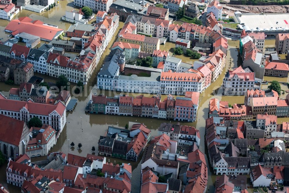 Meißen from the bird's eye view: The situation during the flooding in East Germany on the bank of the river Elbe in the city centre of Meißen in the free state of Saxony. Affected by the high water and flooding are historical buildings of the historic centre